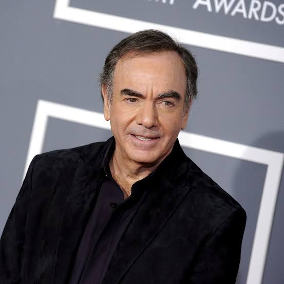 The iconic singer-songwriter Neil Diamond in a contract with….