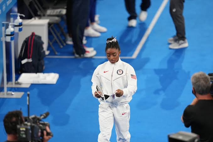 Simone Biles at the exit door of gymnastics activities… read more