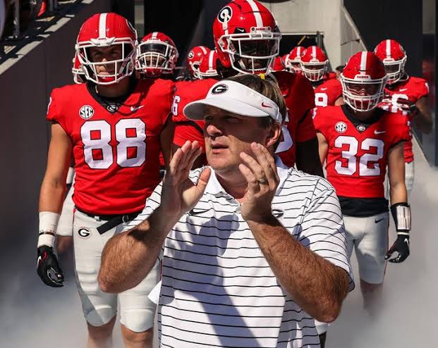 Just announced Georgia coach celebrated with newly committed bulldogs.. read more 