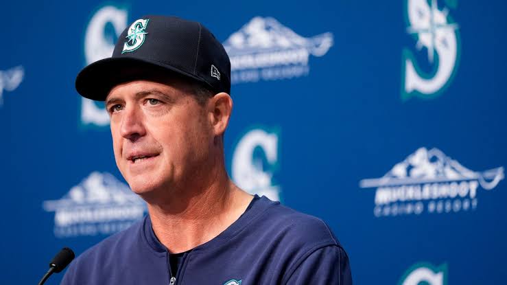 Tragic News: Seattle Mariners Manager Dan Wilson has been fined $89,000 and issued a formal warning by the MLB following an incident during a recent game against the Houston Astros. The disciplinary action comes after Wilson was heard shouting an expletive three times in response to…… MLB’S decision to penalize Wilson underscores the organization’s emphasis on maintaining sportsmanship and professional conduct, particularly from…